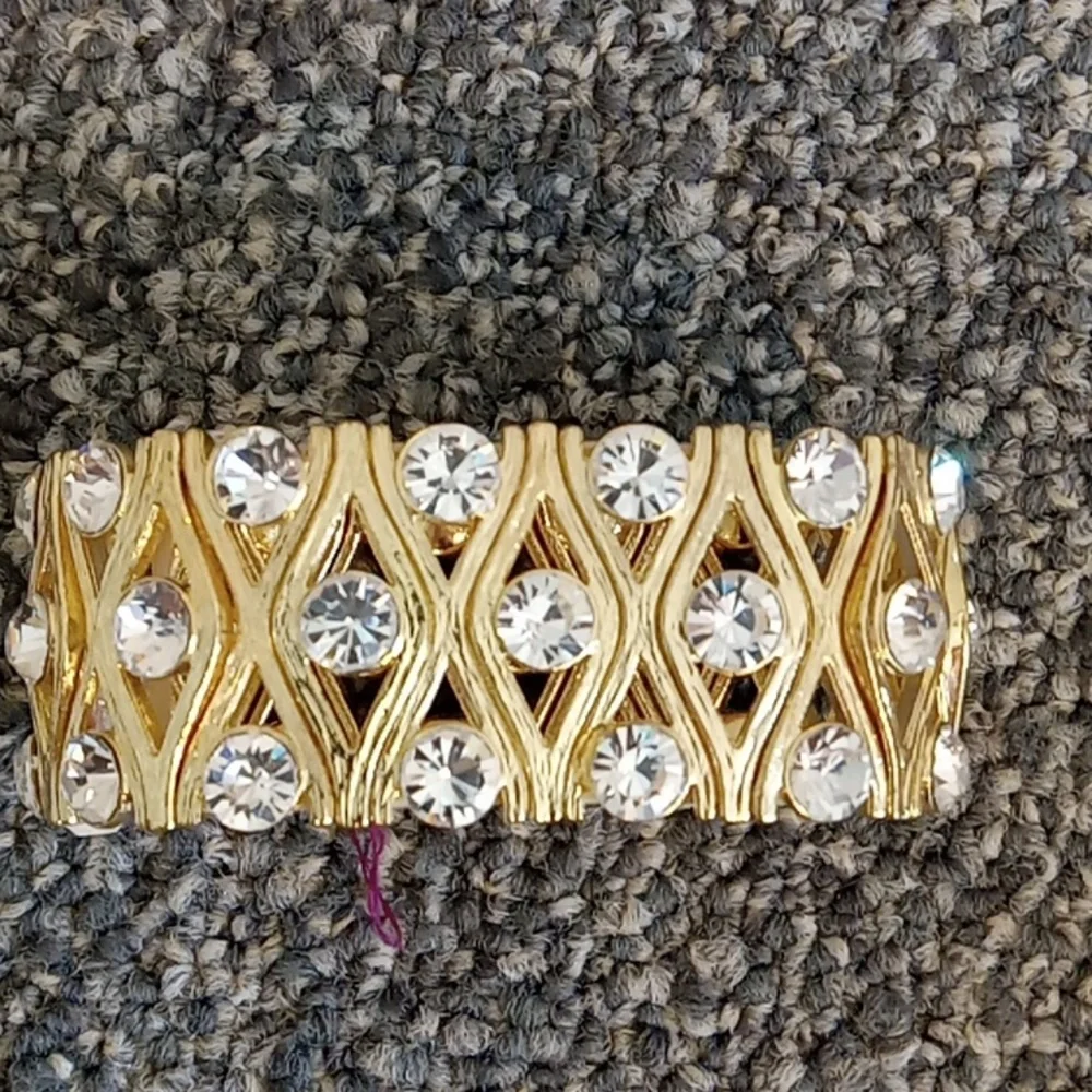 Gold tone and crystal stretch bracelet
